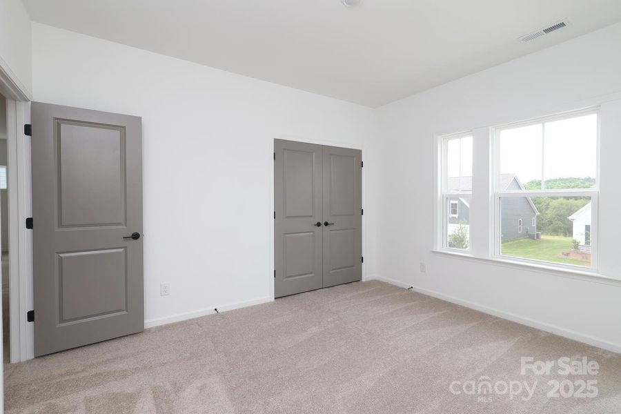 Spacious, unfurnished interior of a new home in Estates at Sugar Creek, Indian Land (Image 18).