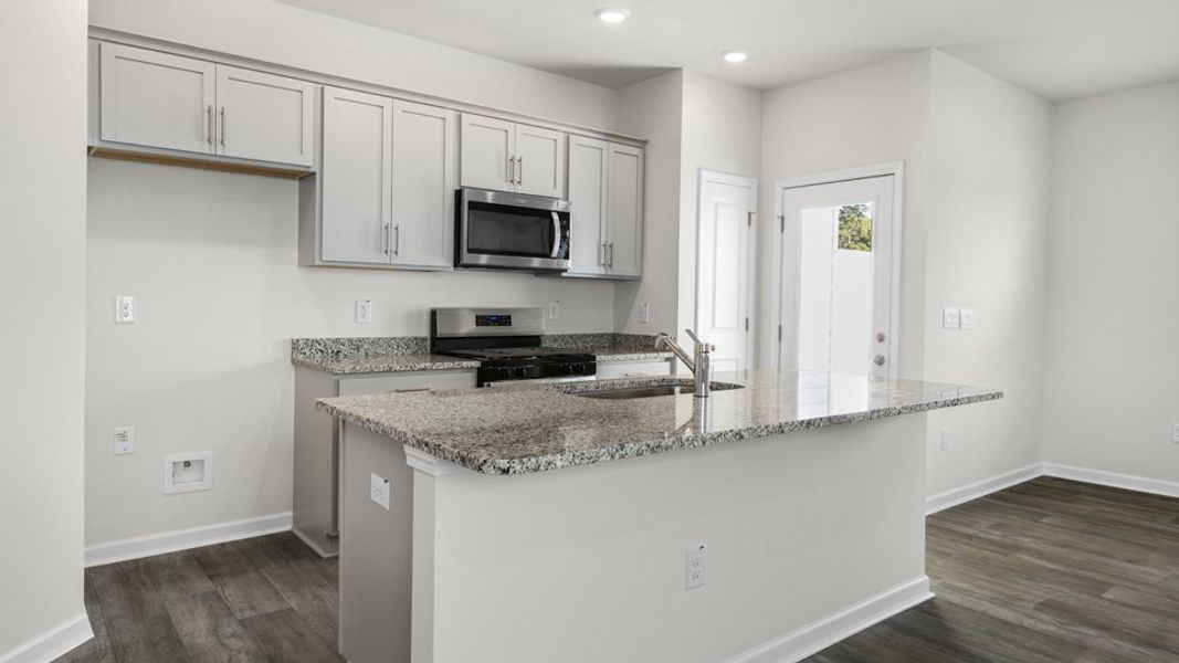 Furnished interior view inside a new home in The Townes at Galvins Ridge, Sanford (Image 5).