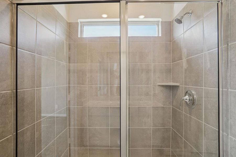 Bathroom with a shower stall