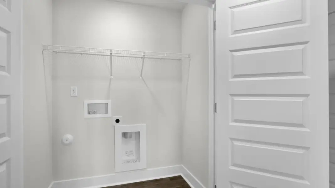 Spacious, unfurnished interior of a new home in The Townes at Cedar Hill Landing, Navassa (Image 27).