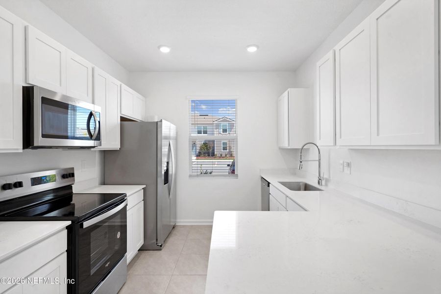 Furnished interior view inside a new home in , St. Augustine (Image 10).