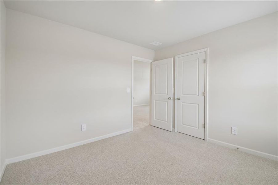 Spacious, unfurnished interior of a new home in Northwoods at Mirror Lake, Villa Rica (Image 35).