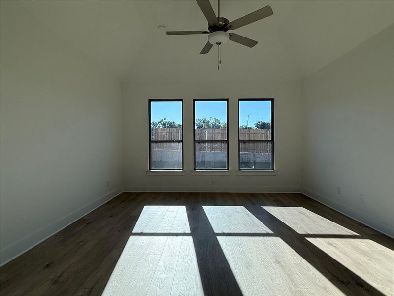 Primary Bedroom with elevated ceiling Primary Bedroom with elevated ceiling
