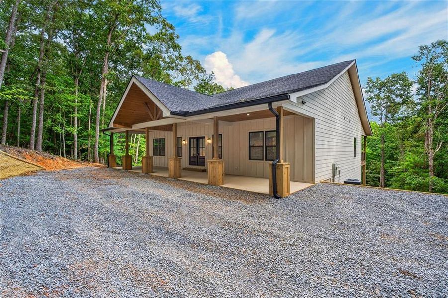 Exterior details and patio area of a home in , Ellijay (Image 32).