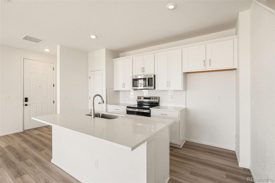 Furnished interior view inside a new home in , Aurora (Image 8). Furnished interior view inside a new home in , Aurora (Image 8).