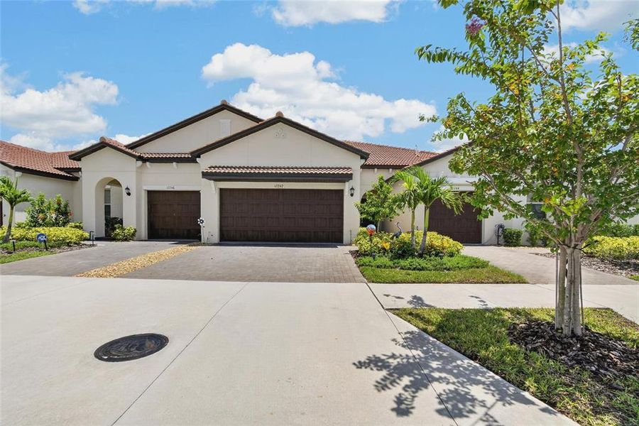 Front exterior of a new home in Southshore Bay Active Adult, Wimauma, FL, highlighting curb appeal (Image 25).