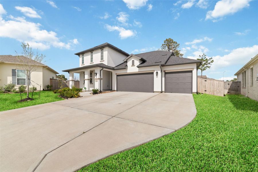 Front exterior of a new home in , Tomball, TX, highlighting curb appeal (Image 19). Front exterior of a new home in , Tomball, TX, highlighting curb appeal (Image 19).