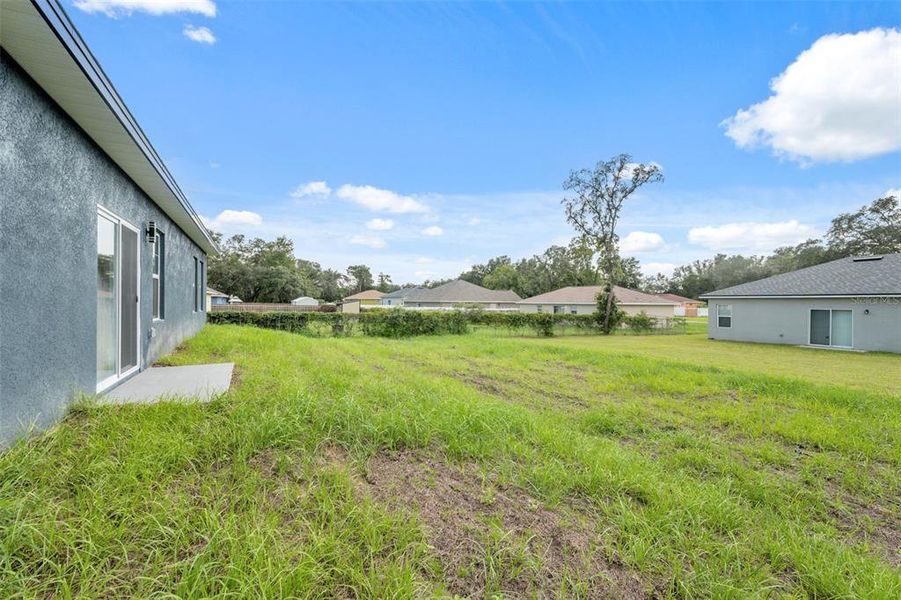 Front exterior of a new home in , Ocala, FL, highlighting curb appeal (Image 2).