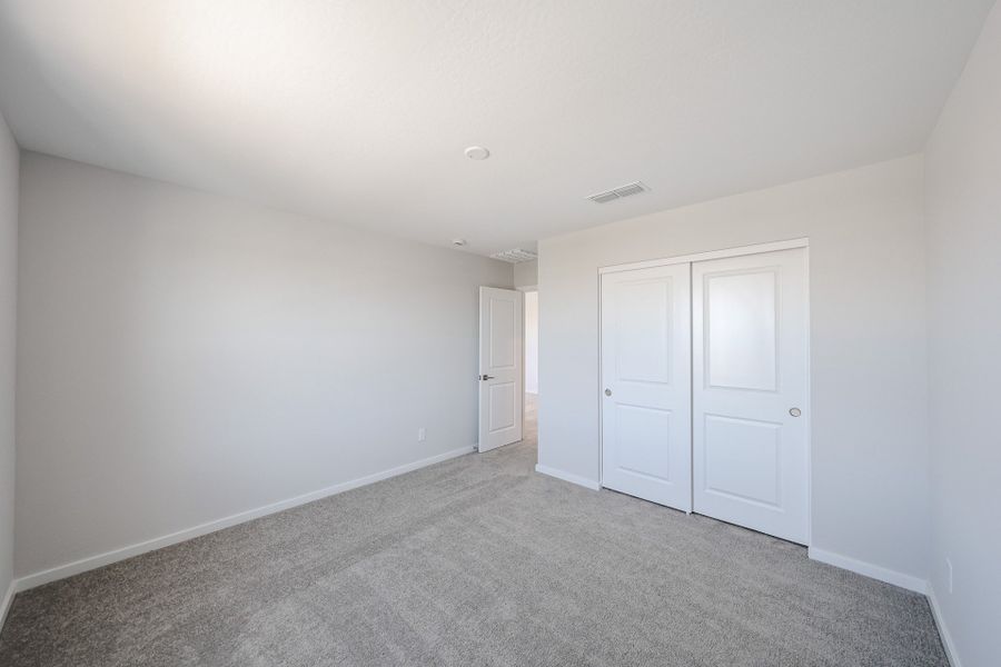 A room with white doors.