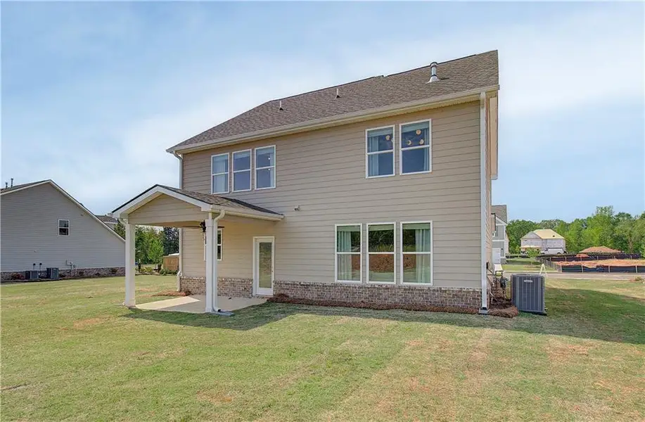 Exterior details and patio area of a home in Cooper Park, McDonough (Image 3).