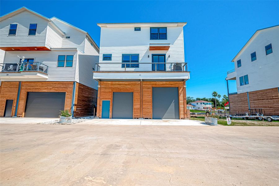 Front exterior of a new home in , Taylor Lake Village, TX, highlighting curb appeal (Image 2).