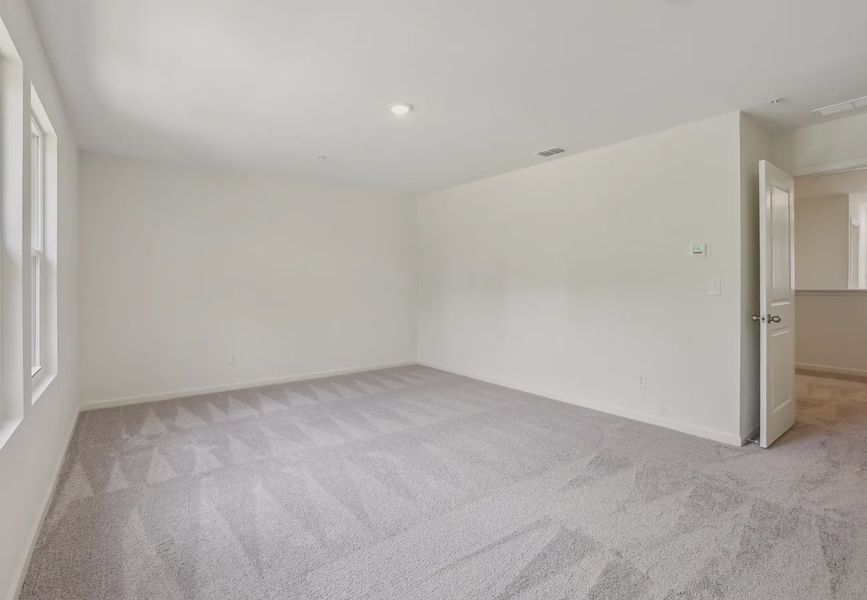 Representative unfurnished interior of a home built from the Echo by Starlight Homes in Hawks Run, Kissimmee (Image 4).