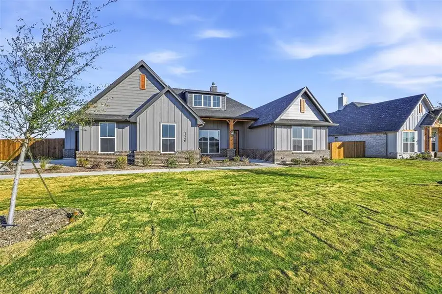Exterior details and patio area of a home in Coyote Crossing, Godley (Image 3).