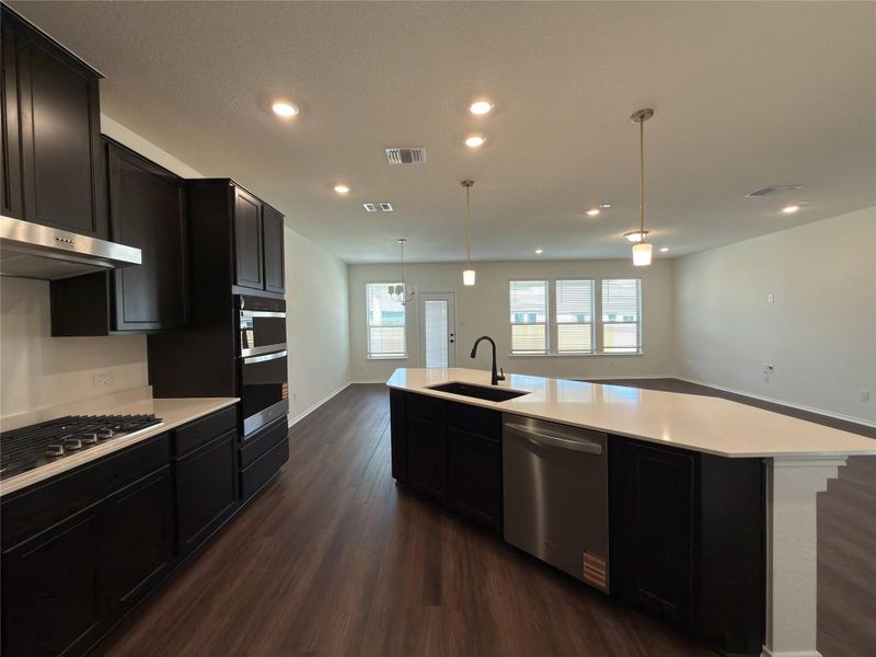 Furnished interior view inside a new home in River Bluff, Leander (Image 6).