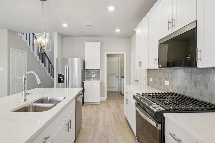 Photo is not of the actual home, but is an inspirational photo of builder’s model home and may depict options, furnishings, and/or decorator features that are not included. Photo is not of the actual home, but is an inspirational photo of builder’s model home and may depict options, furnishings, and/or decorator features that are not included.