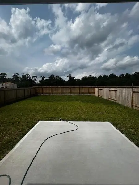 Exterior details and patio area of a home in Townsend Reserve, Splendora (Image 3). Exterior details and patio area of a home in Townsend Reserve, Splendora (Image 3).