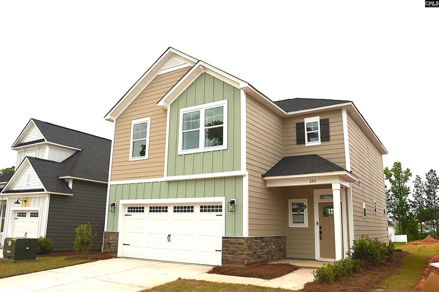 Front exterior of a new home in Bickley Station, Irmo, SC, highlighting curb appeal (Image 21).