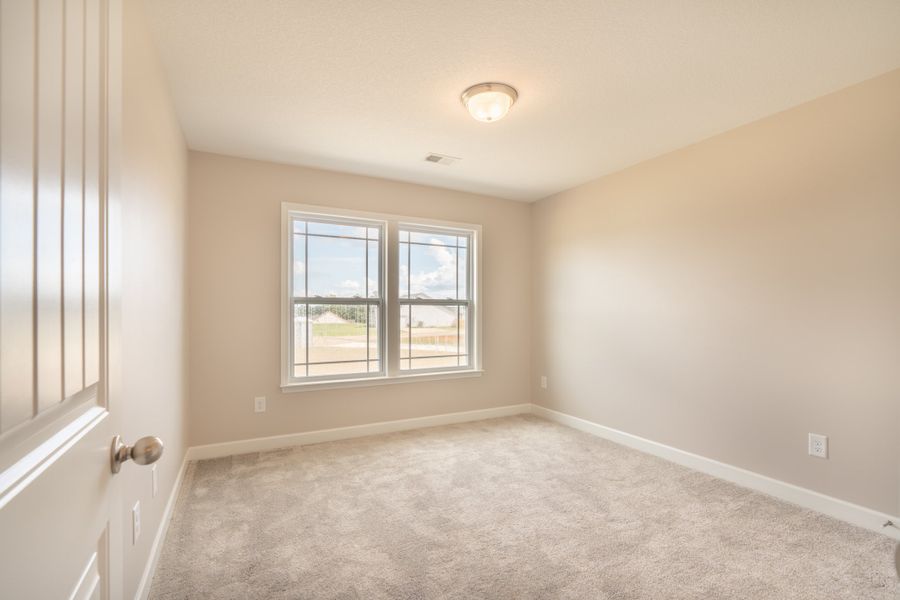 Representative unfurnished interior of a home built from the Sage by Enchanted Homes in Lonesome Dove, San Antonio (Image 24).