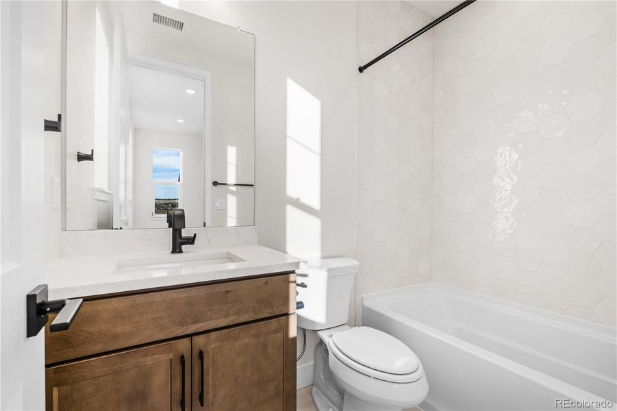 Furnished interior view inside a new home in Luxe at The Canyons, Castle Pines (Image 12).