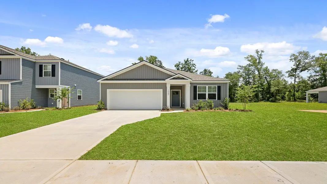 Front exterior of a new home in The Ranch, Holly Hill, SC, highlighting curb appeal (Image 1). Front exterior of a new home in The Ranch, Holly Hill, SC, highlighting curb appeal (Image 1).
