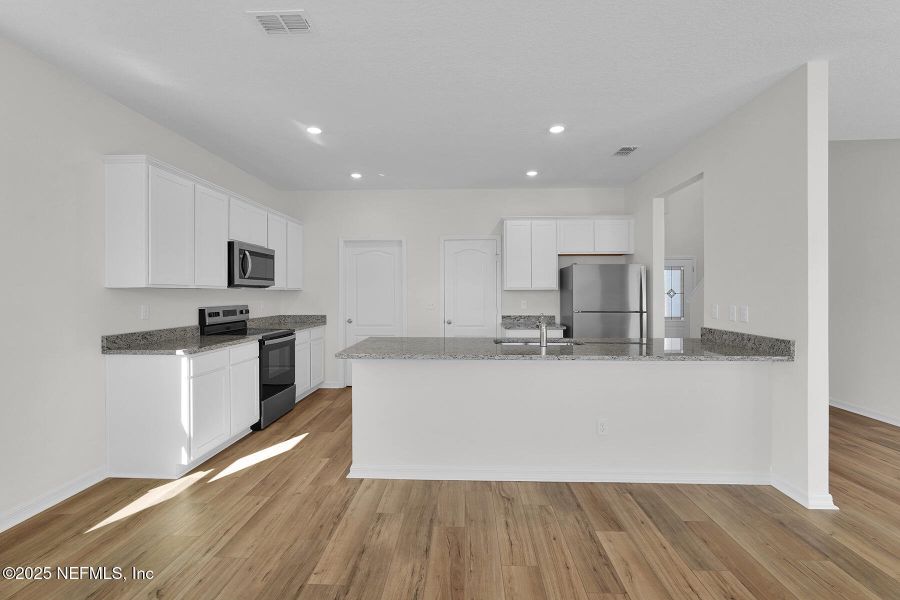 Furnished interior view inside a new home in Westport Landing, Jacksonville (Image 6).