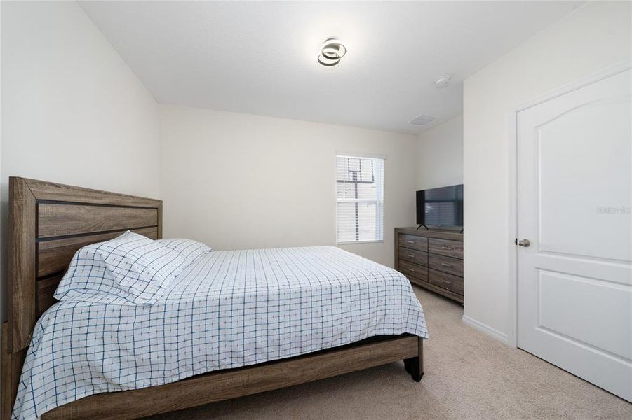 Furnished interior view inside a new home in Cascades, Davenport (Image 8).