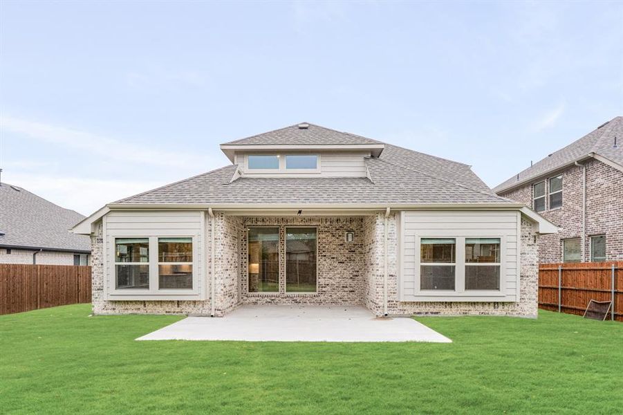 Front exterior of a new home in Mockingbird Heights Classic 60, Midlothian, TX, highlighting curb appeal (Image 26).