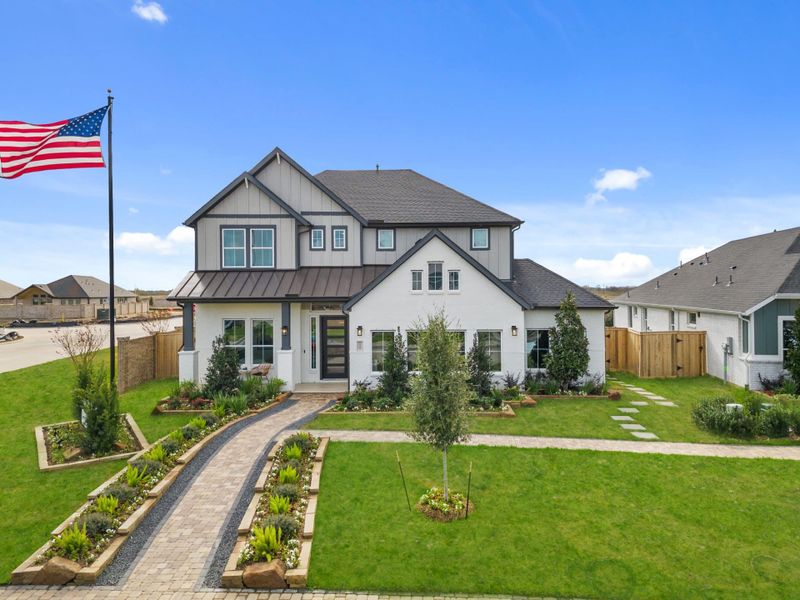 Representative exterior photo of a completed home built from the Acadia with 3-Car Garage by Chesmar Homes in Westland Ranch, League City, TX (Image 29). Representative exterior photo of a completed home built from the Acadia with 3-Car Garage by Chesmar Homes in Westland Ranch, League City, TX (Image 29).