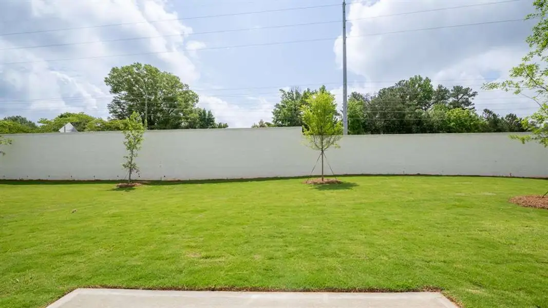 Exterior details and patio area of a home in The Village at Sandy Plains, Marietta (Image 2). Exterior details and patio area of a home in The Village at Sandy Plains, Marietta (Image 2).