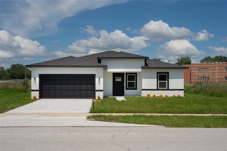 Front exterior of a new home in , Ocala, FL, highlighting curb appeal (Image 26).