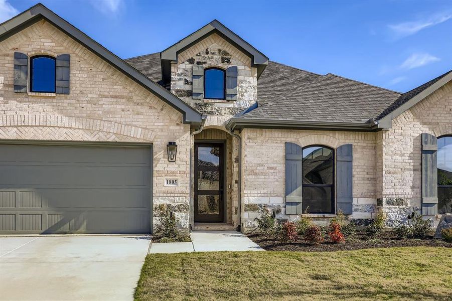 Front exterior of a new home in M3 Ranch 60s, Mansfield, TX, highlighting curb appeal (Image 18).
