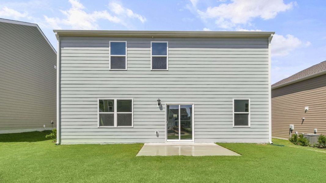 Exterior details and patio area of a home in Tyler - Home on the Lake, New Bern (Image 16).