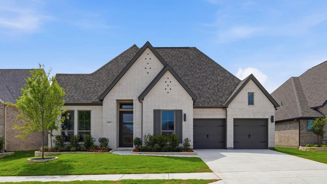 Front exterior of a new home in Talon Hills, Fort Worth, TX, highlighting curb appeal (Image 1). Front exterior of a new home in Talon Hills, Fort Worth, TX, highlighting curb appeal (Image 1).