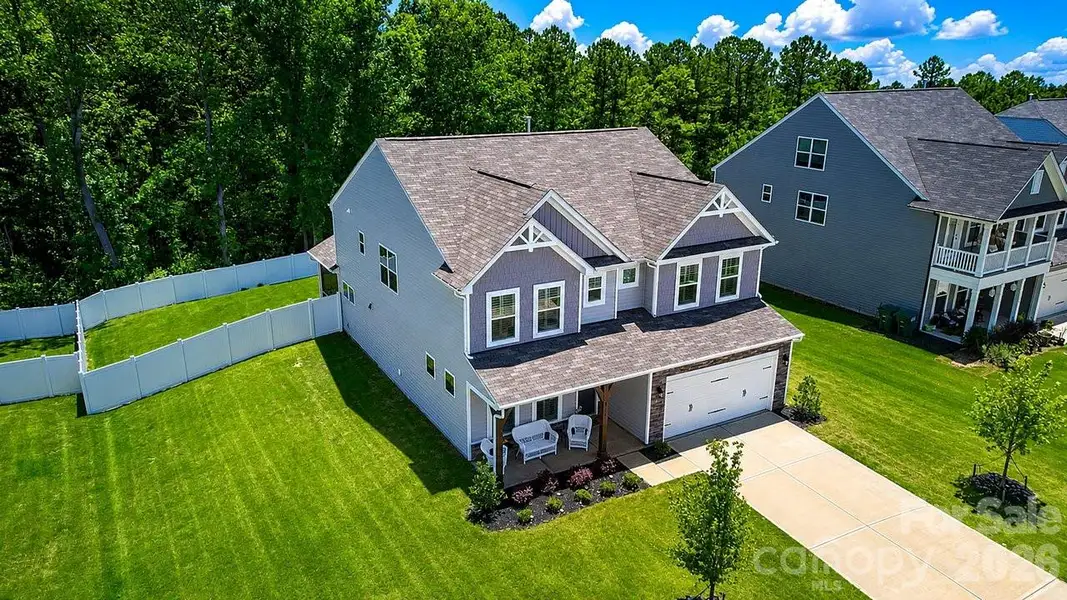 Front exterior of a new home in Winterlake, Gastonia, NC, highlighting curb appeal (Image 23).