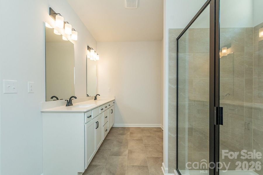 Furnished interior view inside a new home in Sunset Meadows, Charlotte (Image 8).