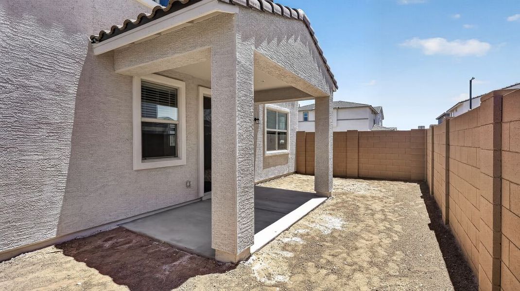 Exterior details and patio area of a home in Artisan at Asante, Surprise (Image 3).