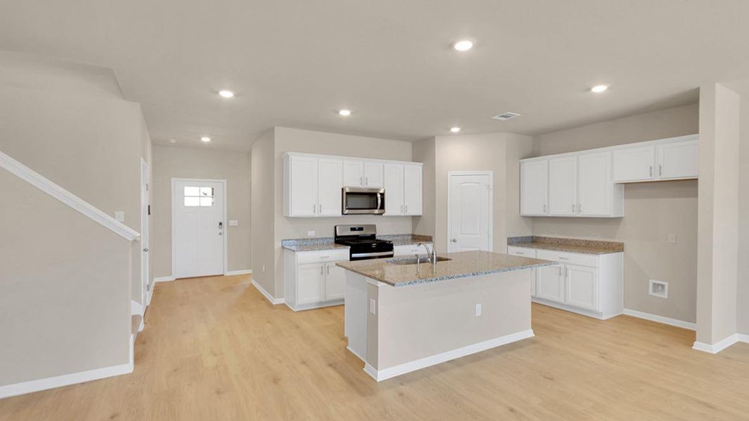 Furnished interior view inside a new home in Bar W Ranch, Leander (Image 11).