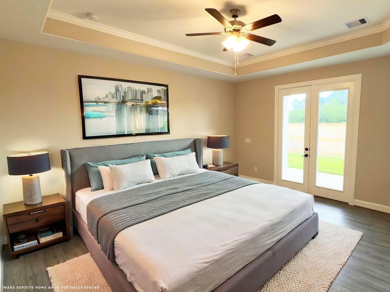 Discover the epitome of luxury and tranquility in the Portico's primary bedroom at Winfrey Estates. This elegant retreat features spacious interiors, exquisite finishes, and a serene ambiance providing the perfect sanctuary. *Image depicts home as-is virtually staged.