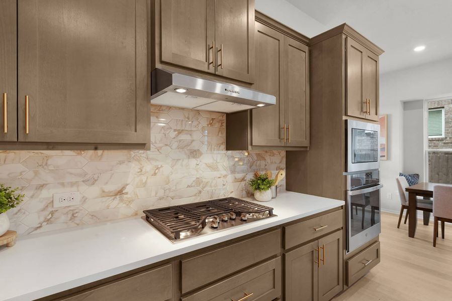 Representative furnished interior of a home built from the Wilson by Chesmar Homes in Deerbrooke Cottages, Leander (Image 7).