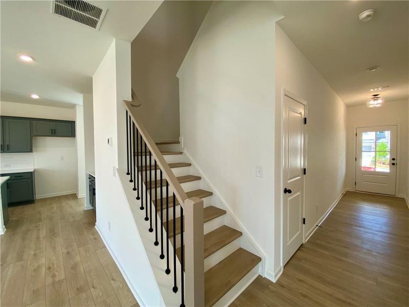 Spacious, unfurnished interior of a new home in Eastlyn Crossing, Flowery Branch (Image 21).