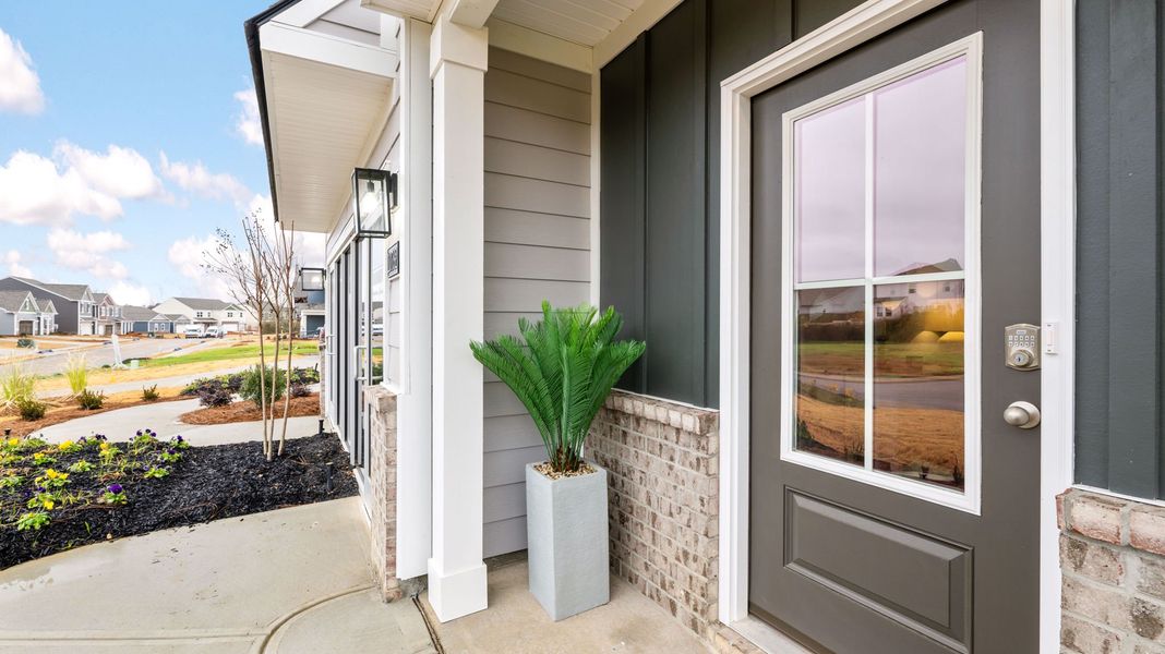 Exterior details and patio area of a home in Prairie Pass, Apison (Image 2).