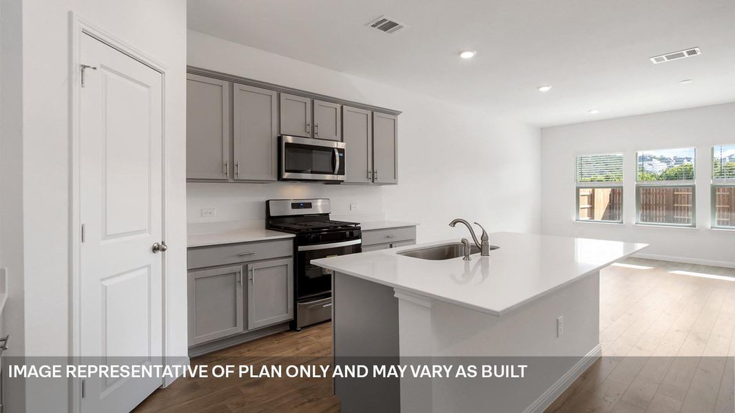 Furnished interior view inside a new home in Bar W Ranch, Leander (Image 4).
