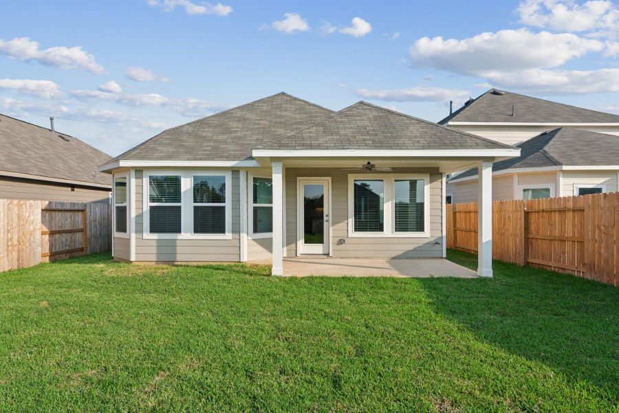 Exterior details and patio area of a home in Lone Star Landing, Montgomery (Image 2). Exterior details and patio area of a home in Lone Star Landing, Montgomery (Image 2).