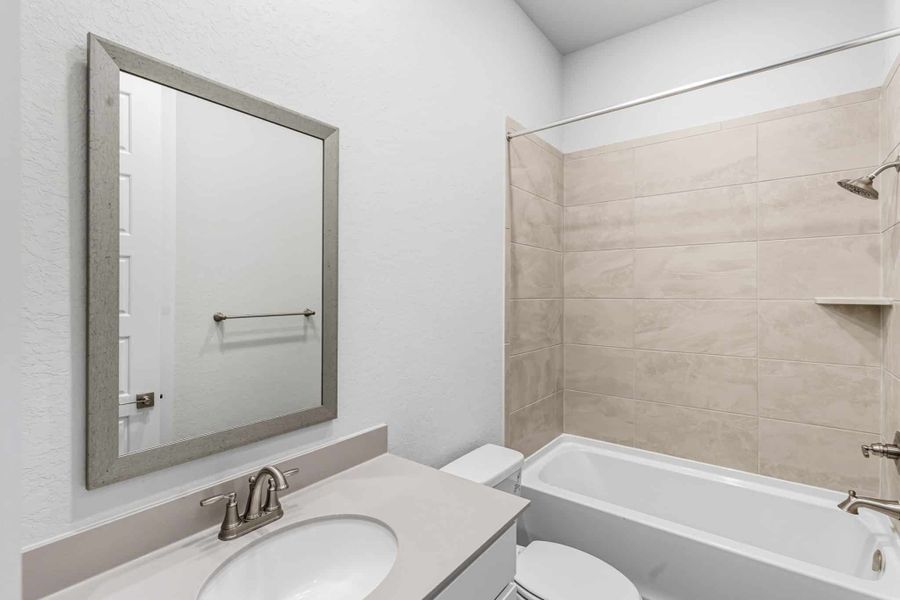 Furnished interior view inside a new home in Prominence – Now Selling, San Antonio (Image 18).