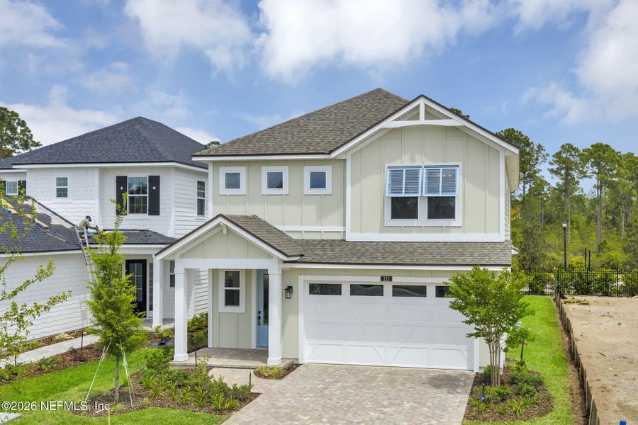 Front exterior of a new home in Seabrook Village at Seabrook, Ponte Vedra, FL, highlighting curb appeal (Image 31). Front exterior of a new home in Seabrook Village at Seabrook, Ponte Vedra, FL, highlighting curb appeal (Image 31).