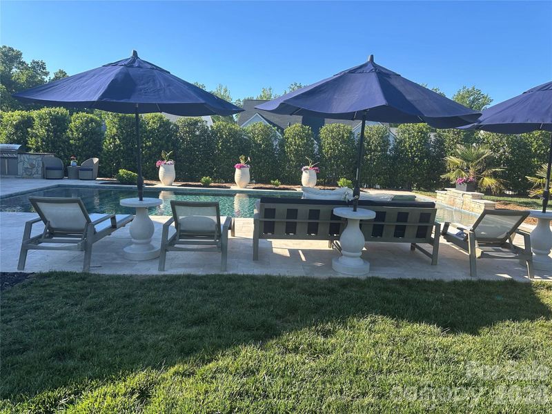 Exterior details and patio area of a home in , Huntersville (Image 23).
