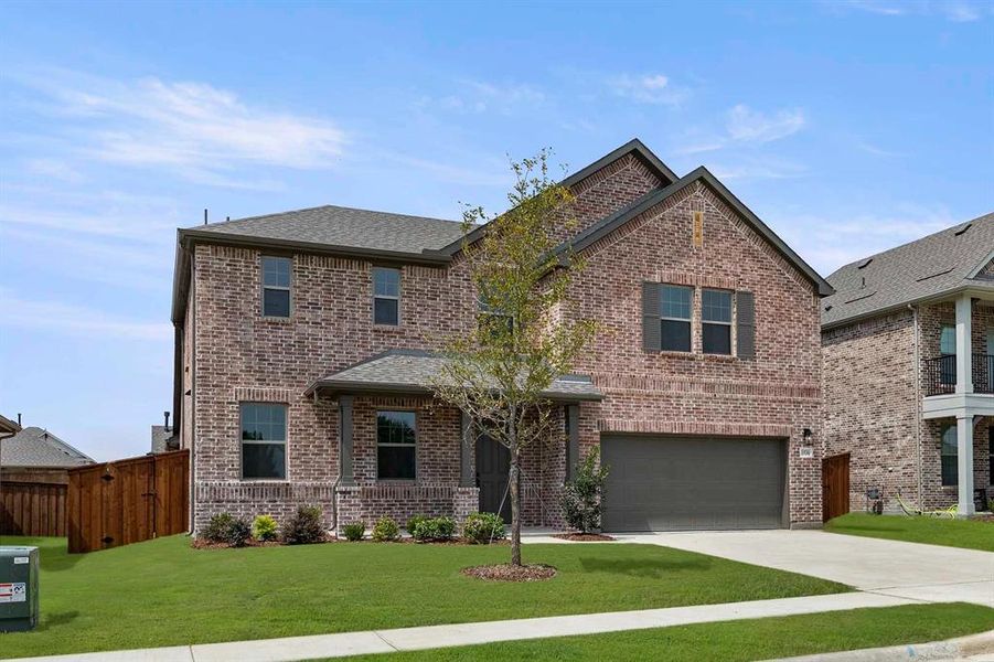Front exterior of a new home in Gateway Parks, Forney, TX, highlighting curb appeal (Image 19). Front exterior of a new home in Gateway Parks, Forney, TX, highlighting curb appeal (Image 19).