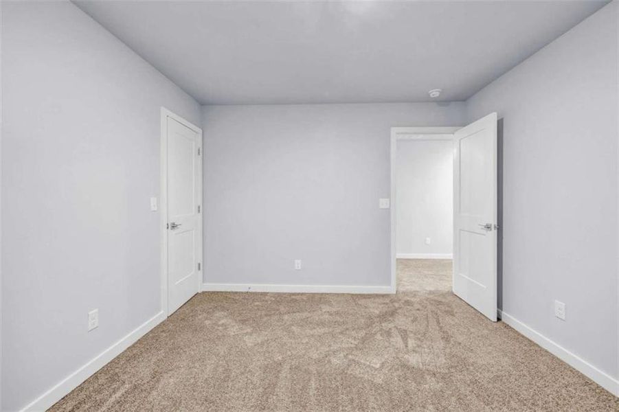 Spacious, unfurnished interior of a new home in Palmetto Oaks Phase III, Palmetto (Image 26). Spacious, unfurnished interior of a new home in Palmetto Oaks Phase III, Palmetto (Image 26).