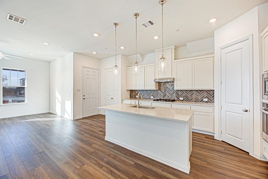 Brown Townhome Kitchen by Ashton Woods