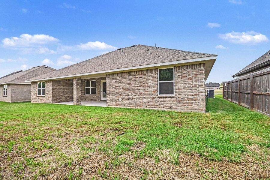 Exterior details and patio area of a home in , Angleton (Image 4).